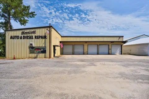 Auto Repair Shop With Service Bays