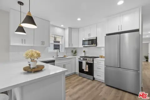 Renovated Spanish Triplex