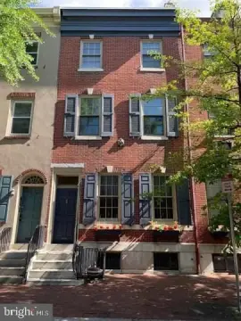 Well-Maintained Triplex with Hardwood Floors