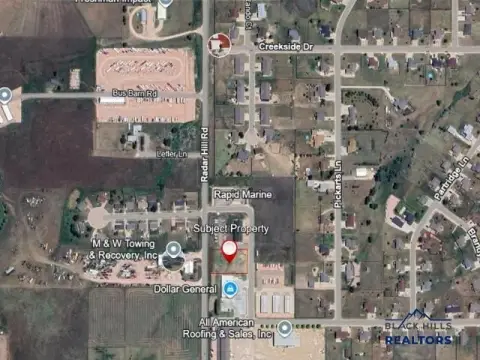 Commercial Land with Building Pad