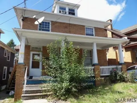 Brick Duplex with Covered Porches