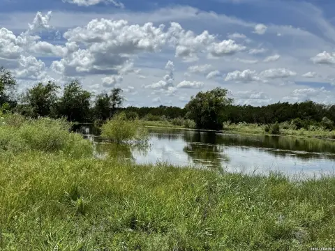 Picturesque Ranch Land with Pond