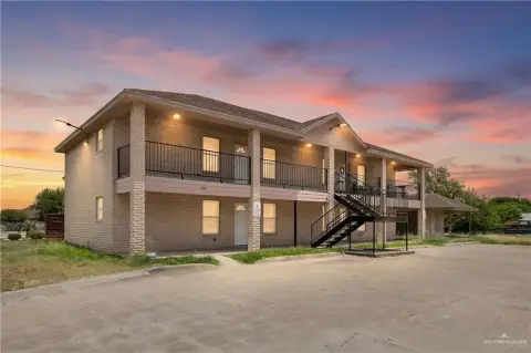 Fourplex Property with Expansion Land