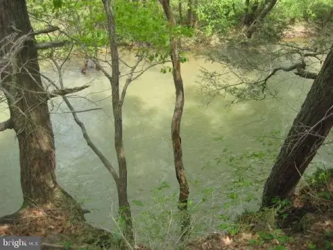 Level Waterfront Land with Creek Access
