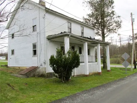 Renovation-Ready Duplex Residence