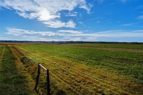 Fenced, Irrigated Farmland with Home