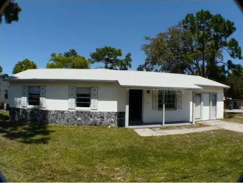 Corner-Lot Duplex With New Roof