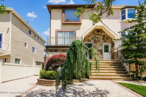 Updated Two-Family Home with Yard