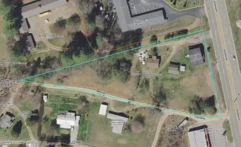 Commercial Land with Rental Units