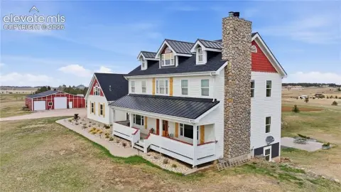 Farmhouse with Barn on Acreage