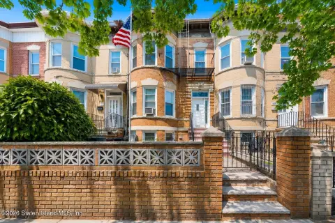 Vacant Brick Three-Family Home