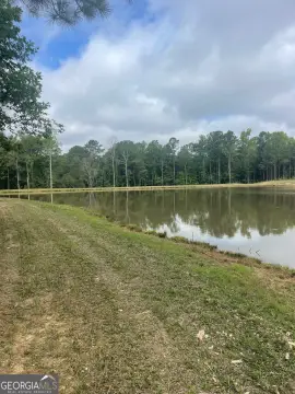 Acreage with Stocked Lake