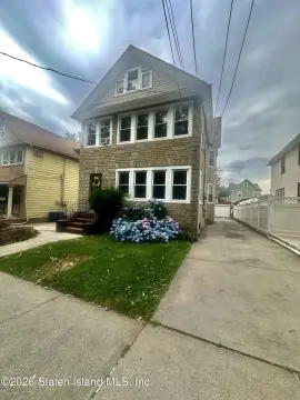 Charming Colonial Duplex with Detached Garage