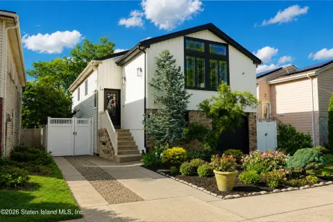 Two-Family Residence with Heated Pool
