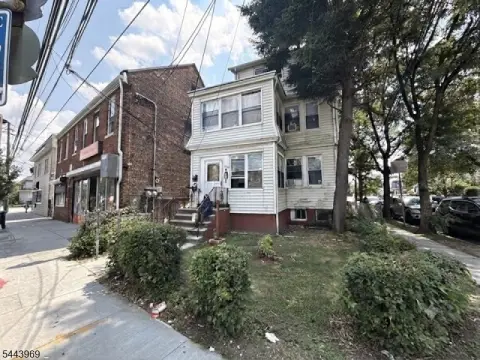 Legal Two-Family Corner Home