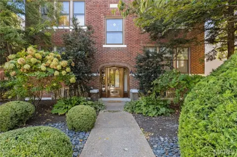 Brick Triplex with Pool