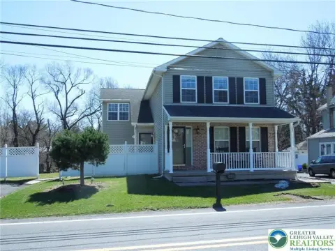 Duplex with Detached Three-Car Garage