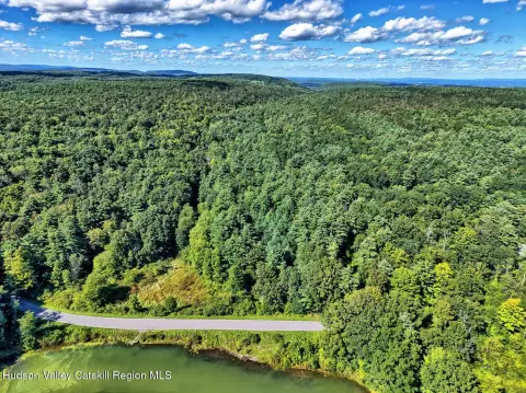 Wooded Recreational Land with Storage Building