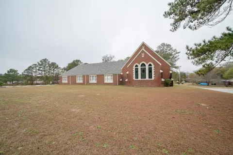 Brick Church with Stained Glass