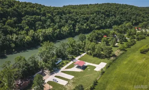 Riverfront Getaway with Camper Amenities