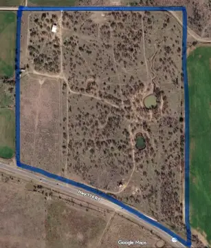 Fenced Ranch Land with Barn
