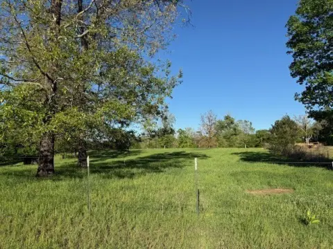 Fenced Agricultural Land with Pond