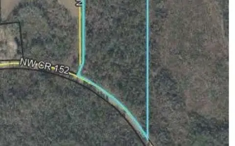 Wooded Farmland Parcel on Paved Road