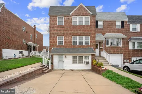 All-Brick Triplex with 4-Car Driveway