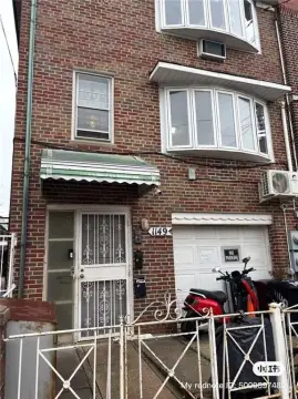 Brooklyn Three-Family Home with Driveway