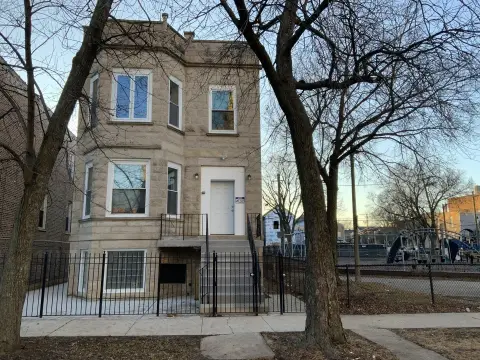 Renovated Greystone Triplex with Parking