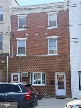 Owner-Occupied Duplex Residence