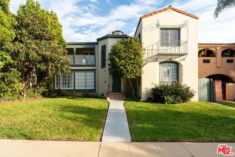 Spanish Colonial Duplex with Garage