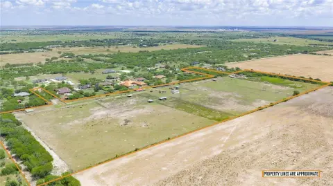 Fenced Agricultural Land with Barns