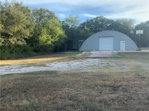 Commercial Land with Existing Buildings