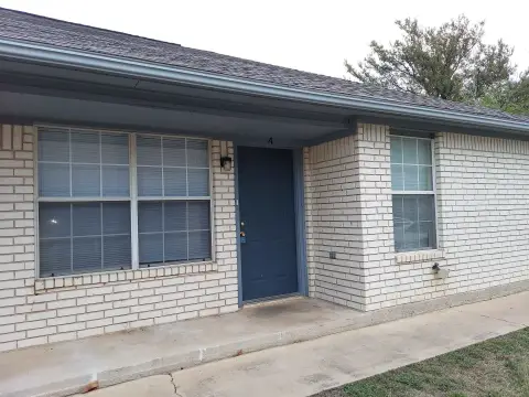 Brick Duplex with Vaulted Ceilings