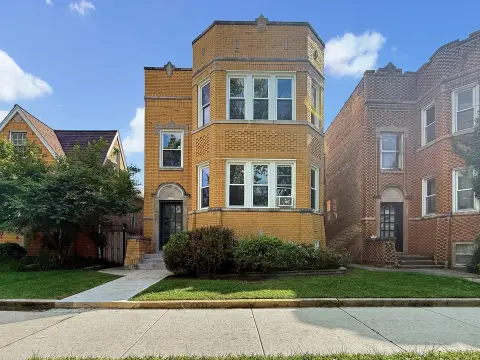 Brick Triplex With Garage