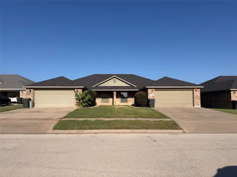 Brick Duplex With Two-Car Garages