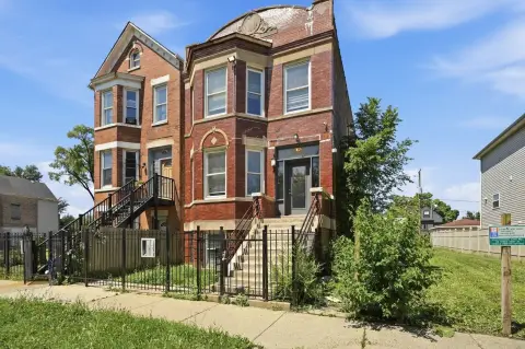 Brick Three-Unit Multifamily Property