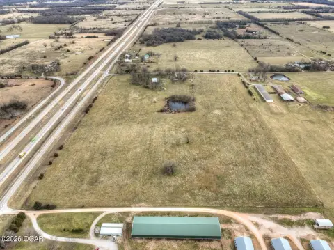 Open Pastureland with Farm Pond