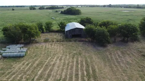 Fenced Farmland Tract with Stock Tanks