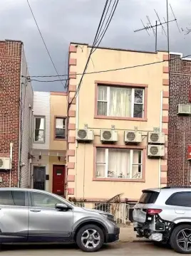 Two-Family Brick House with Basement