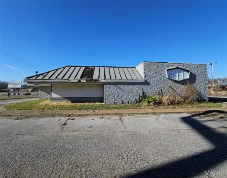 Commercial Land with Existing Structure