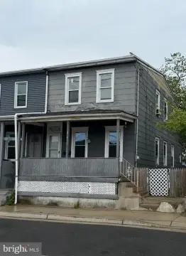 Twin Home Requiring Rehabilitation
