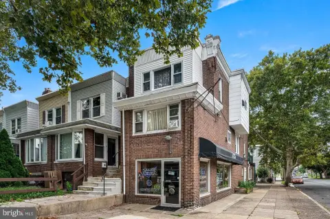 Mixed-Use Property with Two Apartments
