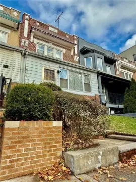 Brick Single-Family Home with Porch