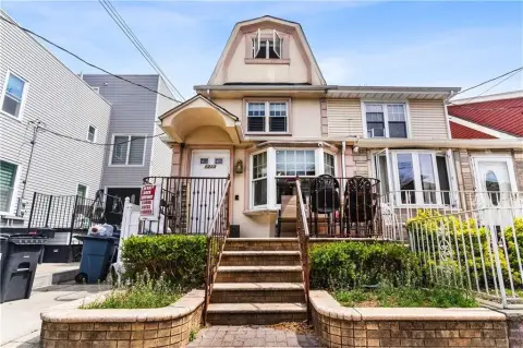 Single-Family Triplex with Driveway
