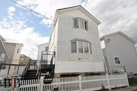Detached Single-Family Home with Carport