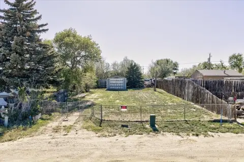 Fenced Mobile Home Lot with Garage