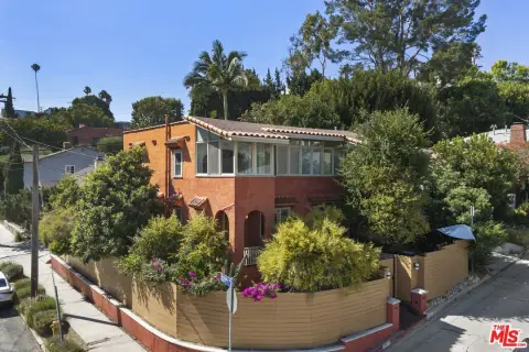 Restored Mediterranean Duplex with Detached Garage