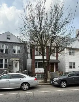 Renovated Three-Family Home Near Waterfront